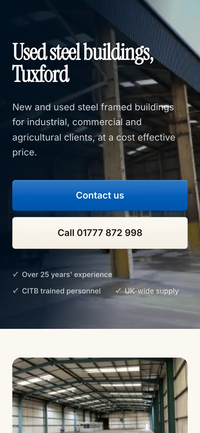 The A1 Steel Buildings website on a phone